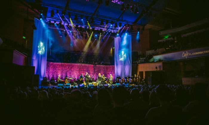 Grace and Danger band on stage at Glasgow Royal Concert hall with large audience